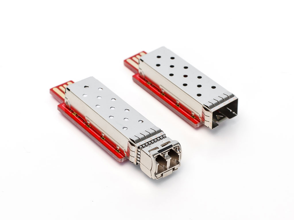 Two SFPTotal Whistle USB coding boards with different transceivers installed